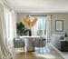white and gray sofa chairs near white window curtain